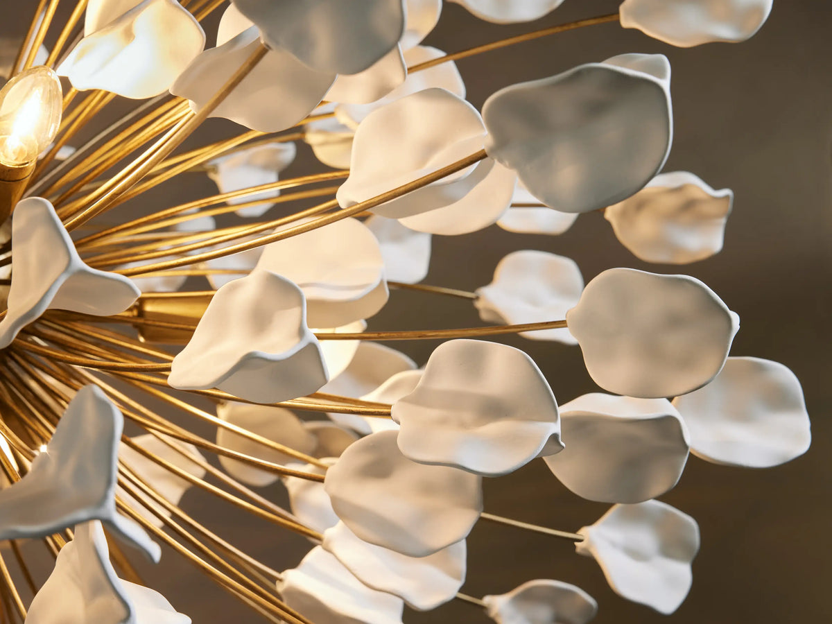 Lunaria Chandelier with iron and 160 white ceramic leaves arranged in a spherical design, suspended by a metal chain.