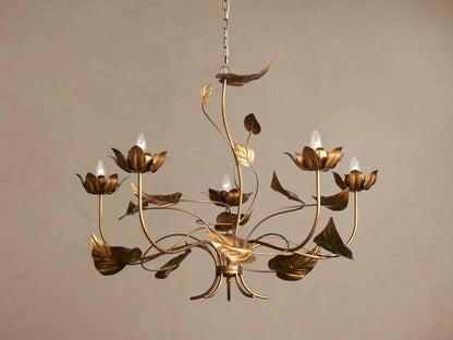Ninfea Chandelier with antiqued gold finish, featuring delicate metal water lily blossoms and leaves with 6 clear bulbs.