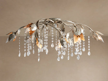Viticcio Flush Mount with artistic silver-finished iron branches and leaves, illuminating bulbs, and sparkling crystal strands.