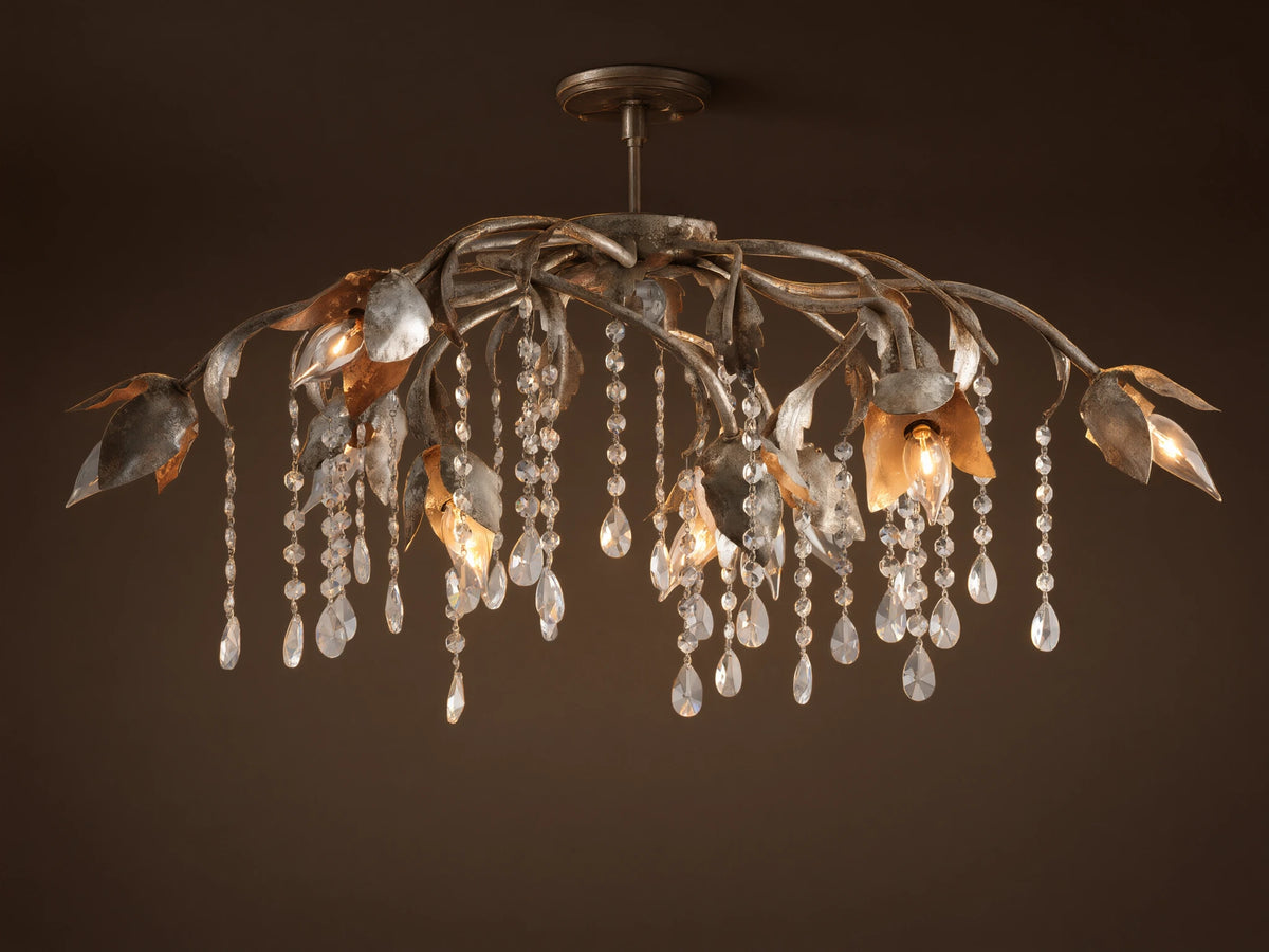 Viticcio Flush Mount with artistic silver-finished iron branches and leaves, illuminating bulbs, and sparkling crystal strands.