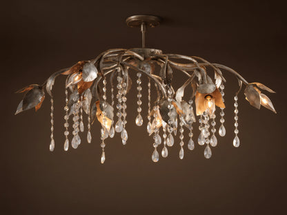 Viticcio Flush Mount with artistic silver-finished iron branches and leaves, illuminating bulbs, and sparkling crystal strands.