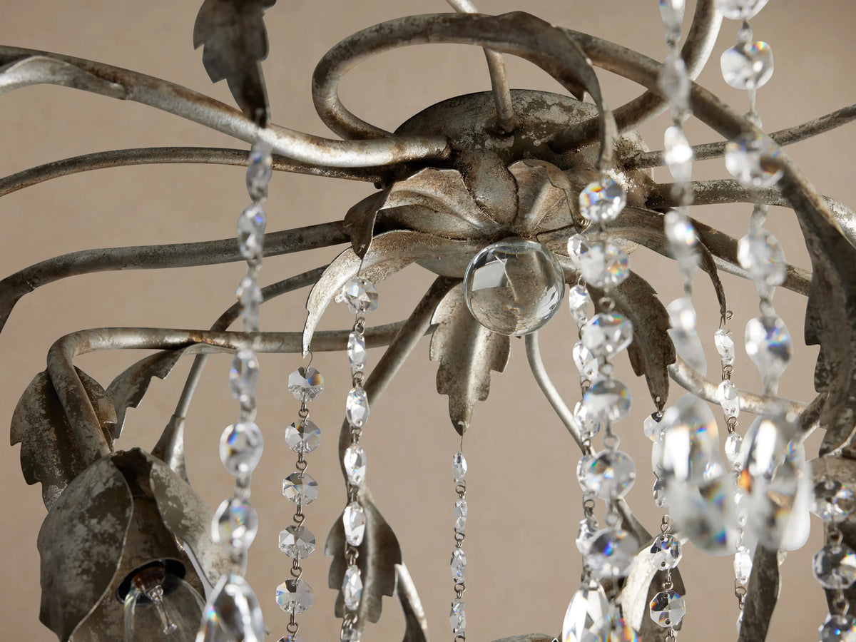 Viticcio Flush Mount with hand-molded silver-finished iron branches and leaves, draped with shimmering clear glass crystals.