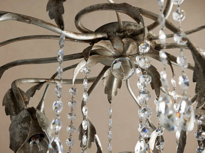 Viticcio Flush Mount with hand-molded silver-finished iron branches and leaves, draped with shimmering clear glass crystals.
