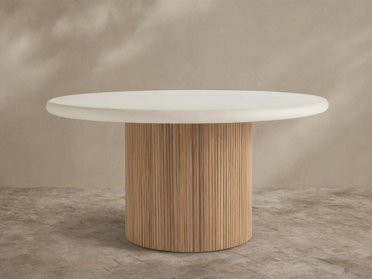 Alesso Outdoor Round Dining Table, cream concrete composite top, light brown fluted reclaimed teak wood cylindrical base.