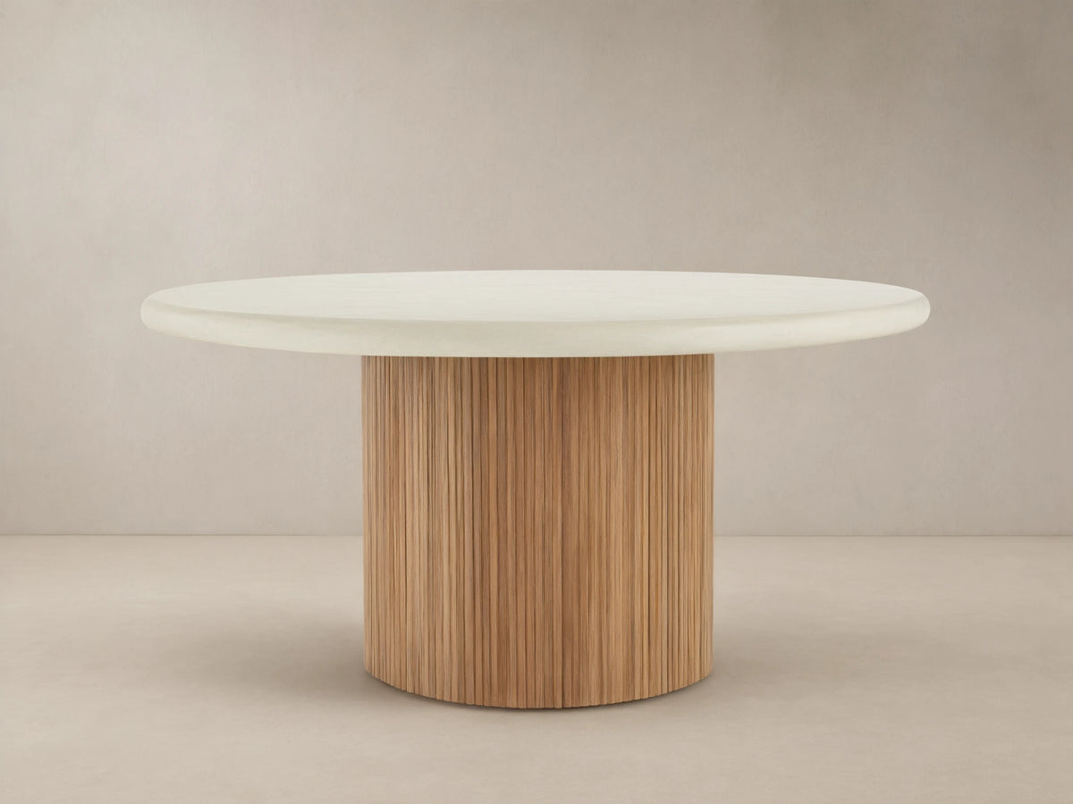 Alesso Outdoor Round Dining Table, cream concrete composite top, light brown fluted reclaimed teak wood cylindrical base.