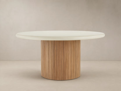 Alesso Outdoor Round Dining Table, cream concrete composite top, light brown fluted reclaimed teak wood cylindrical base.