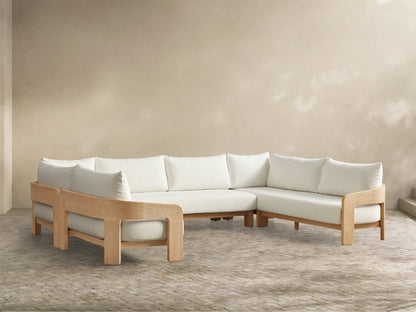 Front view of the U-shaped Anami Outdoor Three-Piece Sectional with light teak frame and white cushions.