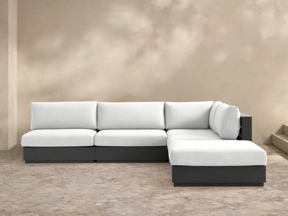 Bal Harbour 5-piece outdoor sectional with white cushions and dark gray aluminum frame on a tiled patio.