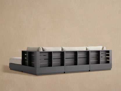 Close-up of Bal Harbour Outdoor Sectional's light greige textured fabric armrest, seat, and back cushions on a dark gray frame.
