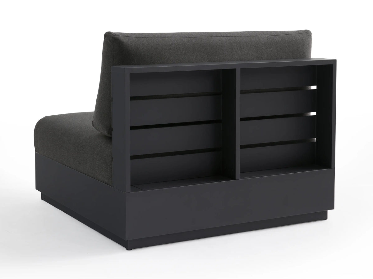 Overhead Bal Harbour Outdoor Armless Chair, dark gray fabric seat & back cushions, dark gray aluminum frame, on beige.