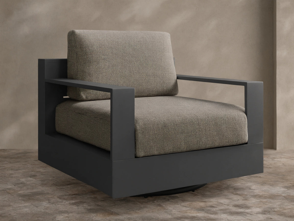 Front view of the Bal Harbour Outdoor Aluminum Swivel Chair, featuring a dark gray frame and light beige textured cushions.