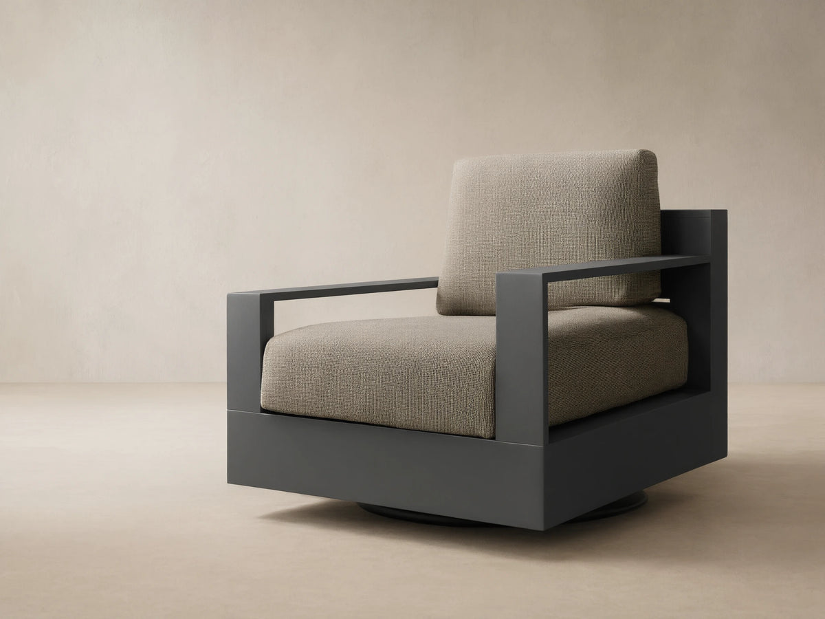 Front view of the Bal Harbour Outdoor Aluminum Swivel Chair, featuring a dark gray frame and light beige textured cushions.