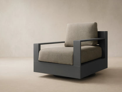 Front view of the Bal Harbour Outdoor Aluminum Swivel Chair, featuring a dark gray frame and light beige textured cushions.