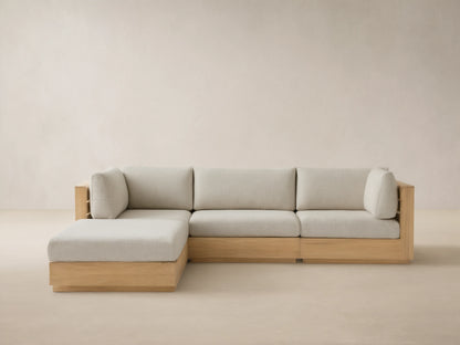 Bal Harbour Outdoor Teak Four-Piece Sectional, L-shaped, with natural teak frame & Eden Oyster cushions on tiled floor.