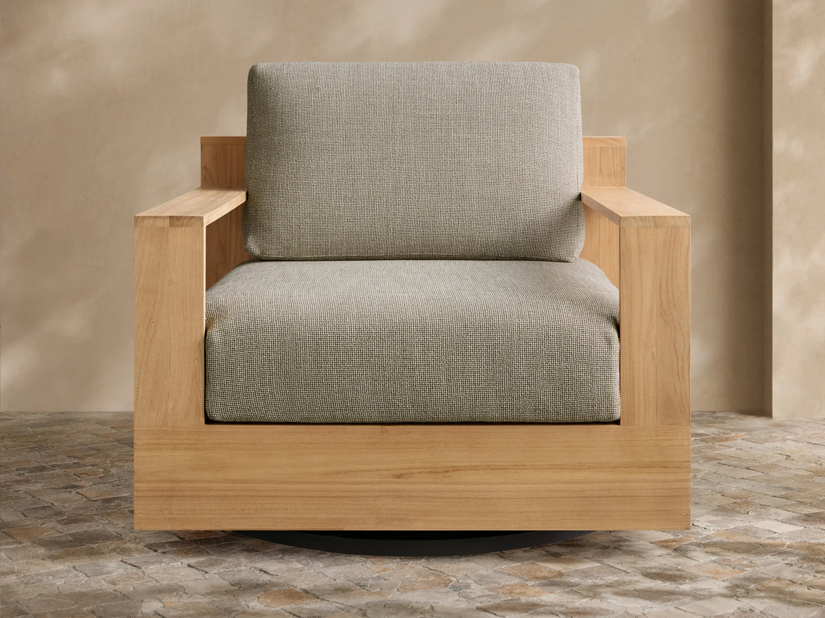 Front view of Bal Harbour Outdoor Teak Swivel Chair with natural teak frame and light gray textured InsideOut Performance Fabrics¬Æ cushions.