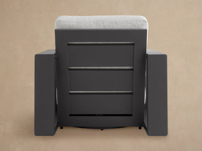 Canyon Outdoor Aluminum Swivel Chair with sleek dark gray frame & light gray textured cushions, angled side view.