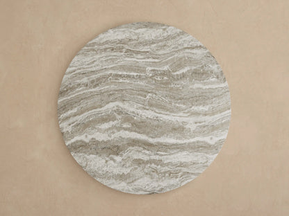 Close-up of Edgewater Outdoor Dining Table's jade faux marble top with intricate white, brown, and grey veining.