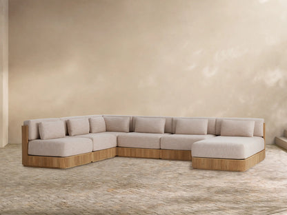 Front view of the Beaumont‚Ñ¢ Outdoor Teak Six-Piece Sectional with Chaise, featuring a slatted teak frame and light beige cushions.