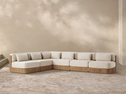 Front view of the Beaumont Outdoor Six-Piece L-Shaped Sectional, featuring a slatted teak wood base and cream cushions.