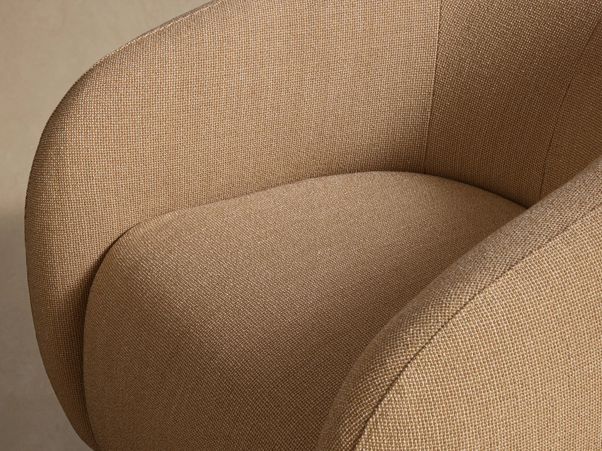 Front view of the beige Fresno Outdoor Swivel Chair, featuring a rounded, armless design and textured fabric.