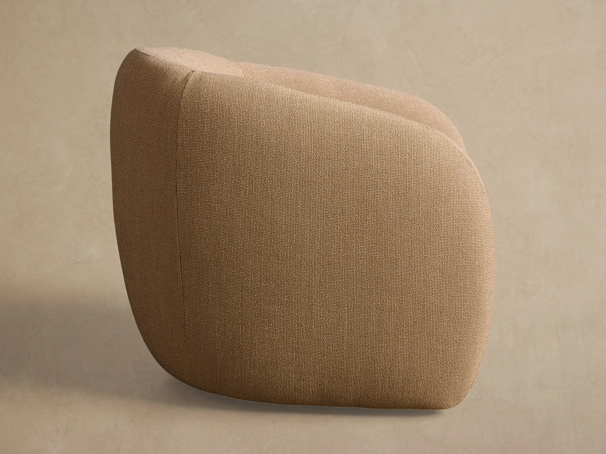 Rear view of the beige woven Fresno Outdoor Swivel Chair, highlighting its curved back and vertical seam detail.