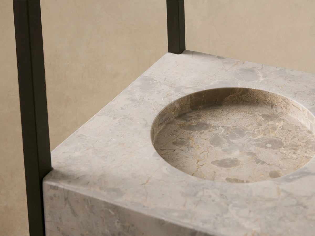 Tall Helios Outdoor Lantern with dark weathered bronze aluminum frame, pyramidal top, and grey marble base with a recess.