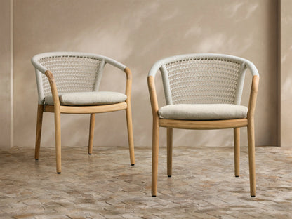 Front view of the Kaia Outdoor Dining Chair with Cushion, with natural teak wood frame, handwoven cream back, and light beige cushion.