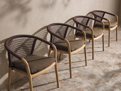 Close-up of the brown Performance Weave polyester rope back and flecked brown cushion of the Kaia Outdoor Dining Chair with Cushion.