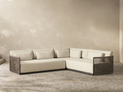 Front view of the Lisbon Outdoor Two-Piece Sectional with light cream cushions, dark brown rope frames, and varied accent pillows.