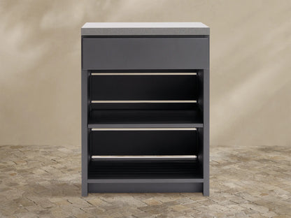 Dark gray outdoor aluminum modular kitchen cabinet with light gray sintered stone top, single drawer, and two slatted shelves.