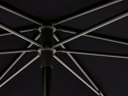 Close-up of Nata Outdoor Round Umbrella, dark blue canopy folded vertically & secured with matching strap with buckle.
