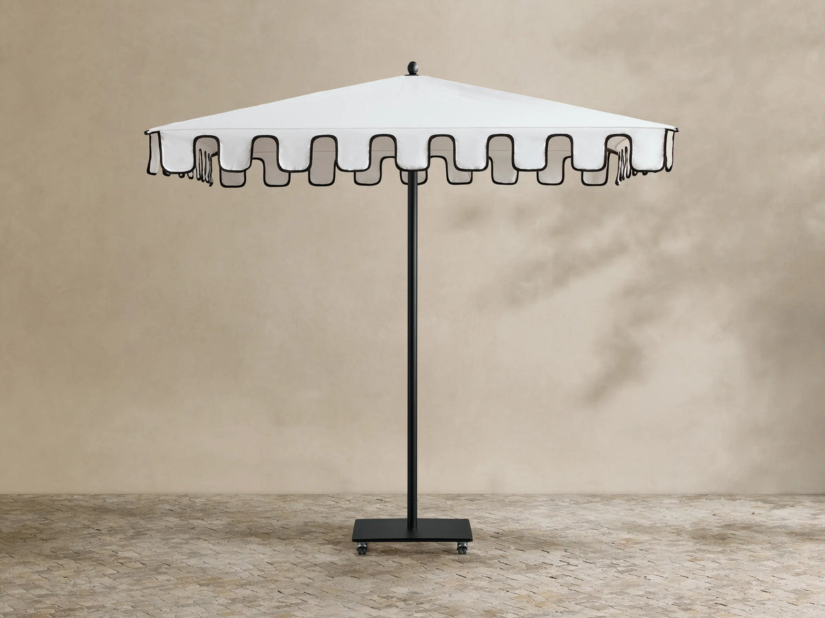 Nata Outdoor Square Scalloped Umbrella, open, white square canopy with black scalloped trim, black pole and wheeled base.