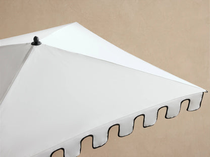 Nata Outdoor Square Scalloped Umbrella, white canopy with bold black scalloped trim, black pole, and square wheeled base.