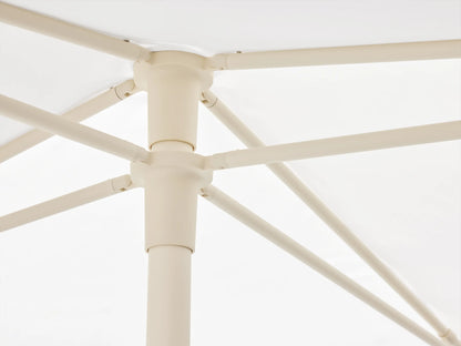 White Nata 79" Outdoor Square Umbrella canopy, viewed from above, showing its square shape and central cap against a beige wall.