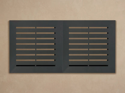 Close-up of Naxos Outdoor Double Coffee Table corner, showing dark gray slatted surface with powder-coated aluminum frame.