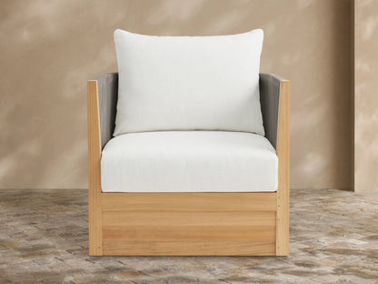 Newport Outdoor Swivel Chair with natural teak frame, dark grey rope arms, and white cushions on a tiled patio.