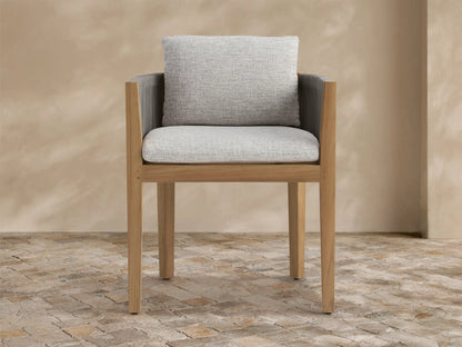 Newport Outdoor Dining Arm Chair, Shardai Zinc, with natural teak frame, dark grey woven rope arms, and light grey seat & back cushions.