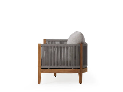 Newport Outdoor Sofa with teak frame, light gray cushions, and woven sides. Sleek, modern design, suitable for outdoor use.