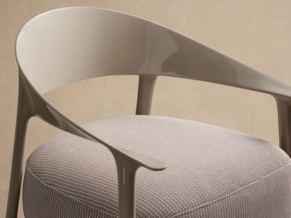 Nia Outdoor Lounge Chair: Light taupe curved frame, arms & legs with a thick, textured brown & cream cushion, facing forward.
