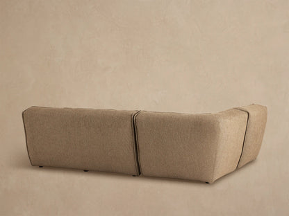 Porto three piece sectional in dark beige fabric with channel stitching