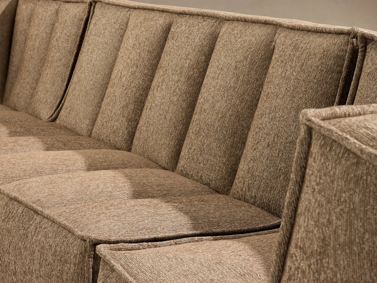 Porto three piece sofa in dark beige fabric with channel stitching