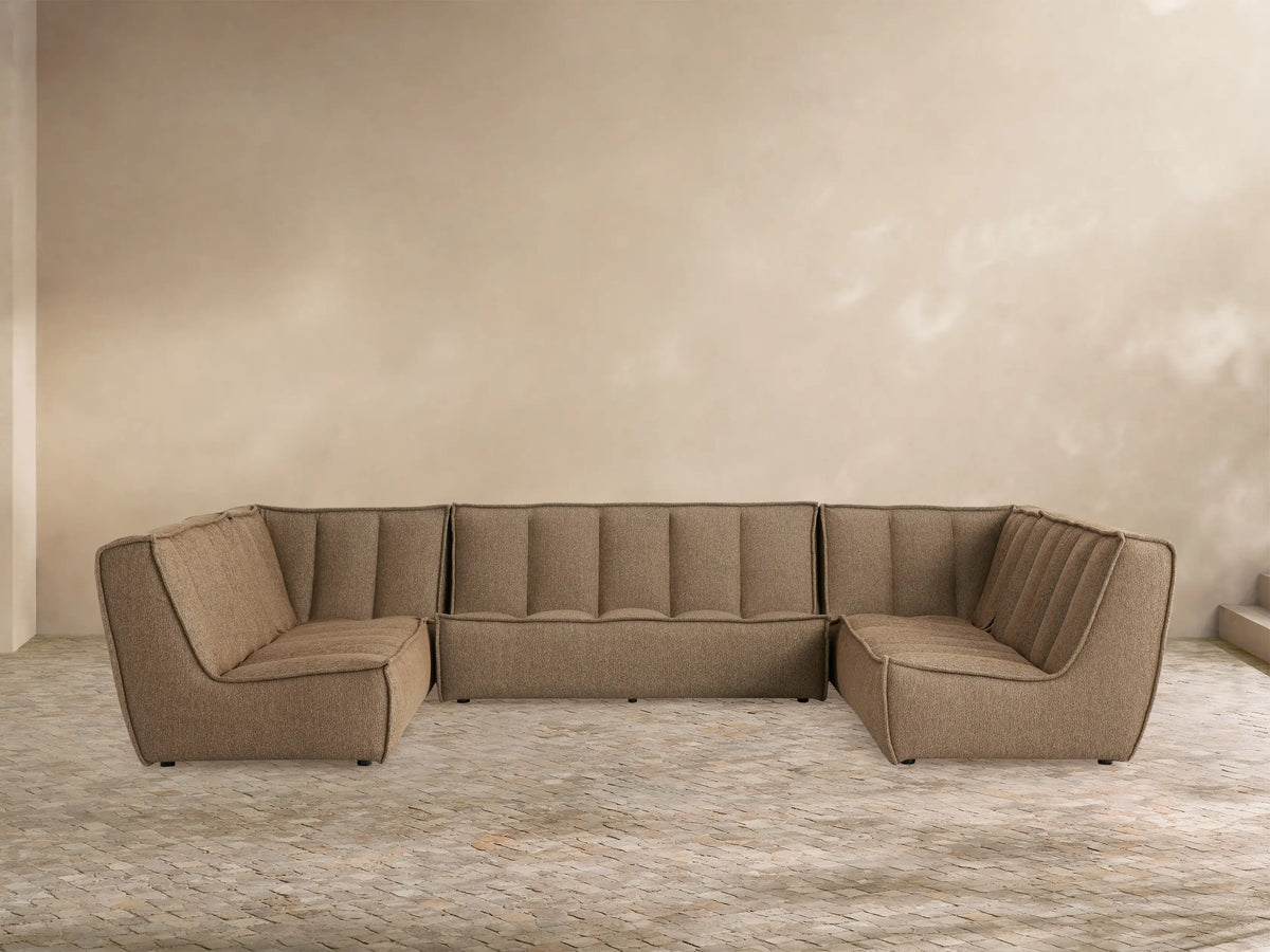 Porto five piece sectional in dark beige fabric with channel stitching