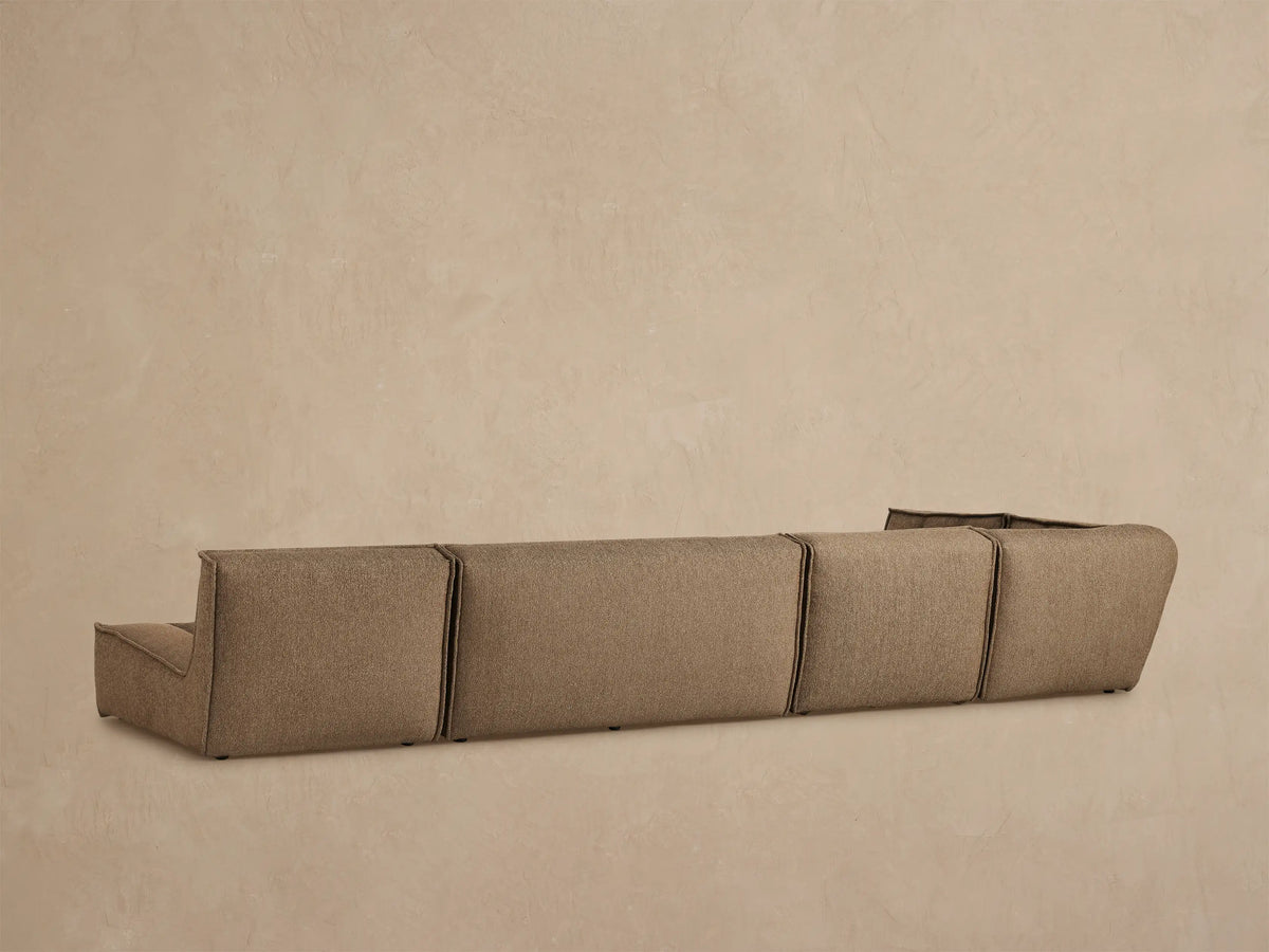 Porto five piece sectional in dark beige fabric with channel stitching