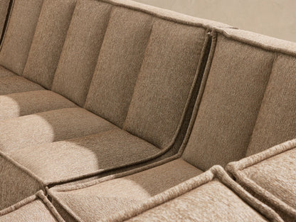 Porto five piece sectional in dark beige fabric with channel stitching