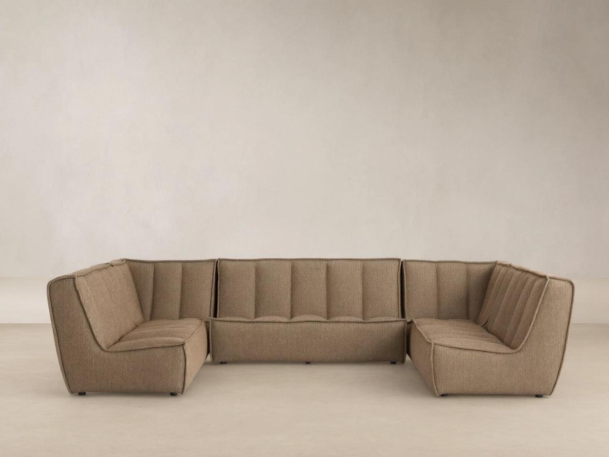 Porto five piece sectional in dark beige fabric with channel stitching