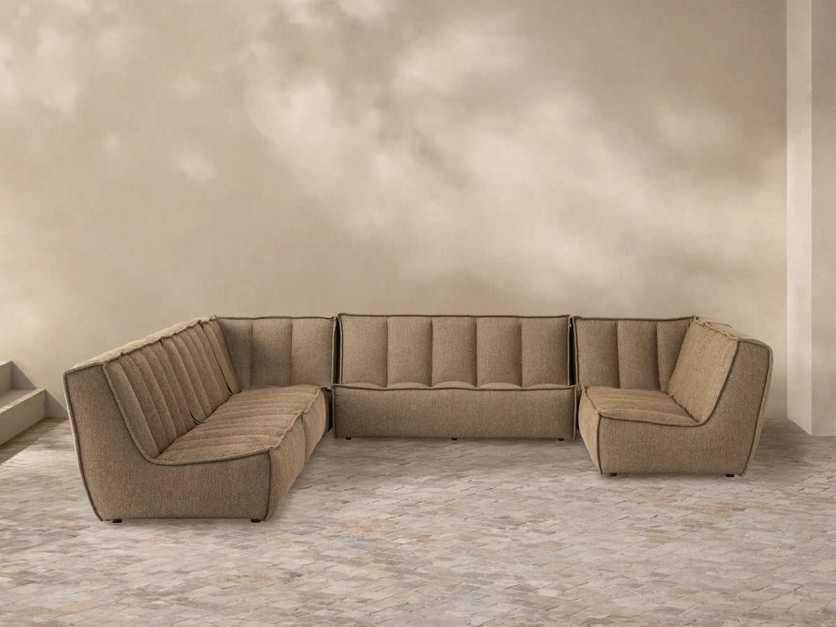 Porto six piece sectional in dark beige fabric with channel stitching