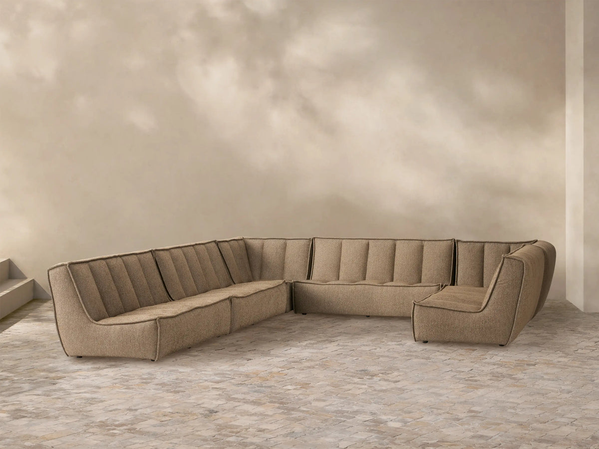 Porto six piece sectional in dark beige fabric with channel stitching