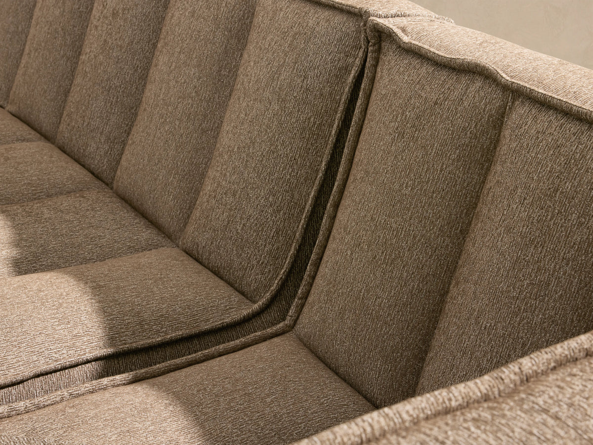 Porto six piece sectional in dark beige fabric with channel stitching