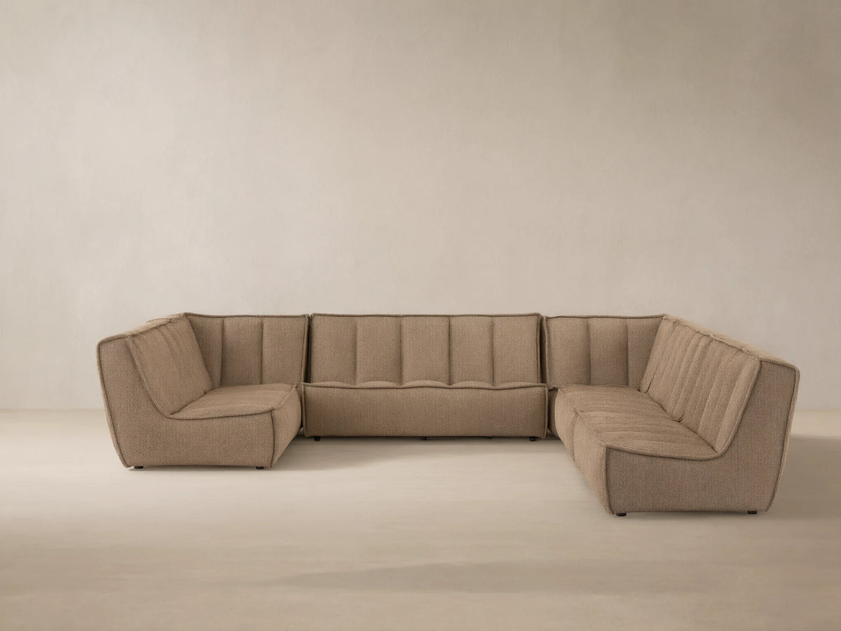 Porto six piece sectional in dark beige fabric with channel stitching