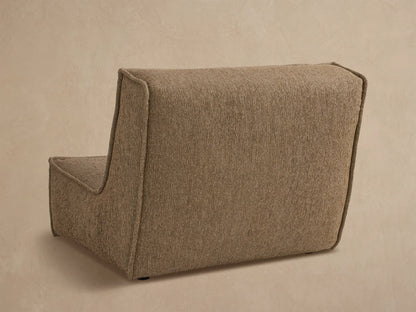 Close up of Porto armless chair in dark beige fabric with channel stitching